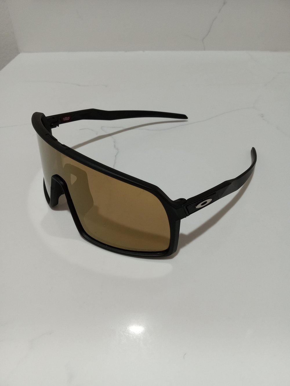 Oakley Black Frame Sunglasses with Brown Lenses